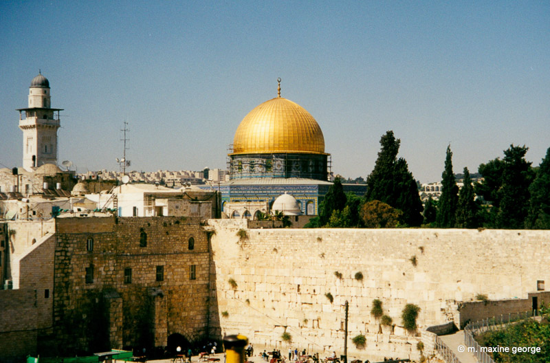 The Wailing Wall with the Dome in the background