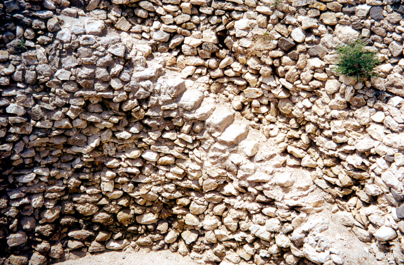 Walls of granary showing steps leading down to the bottom. Megiddo, Israel