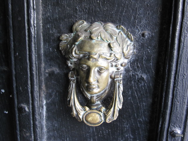 Ancient door knocker at Queens Head Hotel, Monmouth, Wales Picture by M. Maxine George